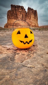 An Early Morning Discovery: Mr. Pumpkin Head's Adventure in Arches &#9834 Any Vision,Arches National Park,Calabaza,Jack-o'-lantern,Labels,Landmarks,Landscape,Plant,Pumpkin,Rock,Sky,Smile,Vacation,Winter squash,Yellow,