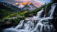 Dawn’s Embrace Waterfall and Mountain Majesty 
